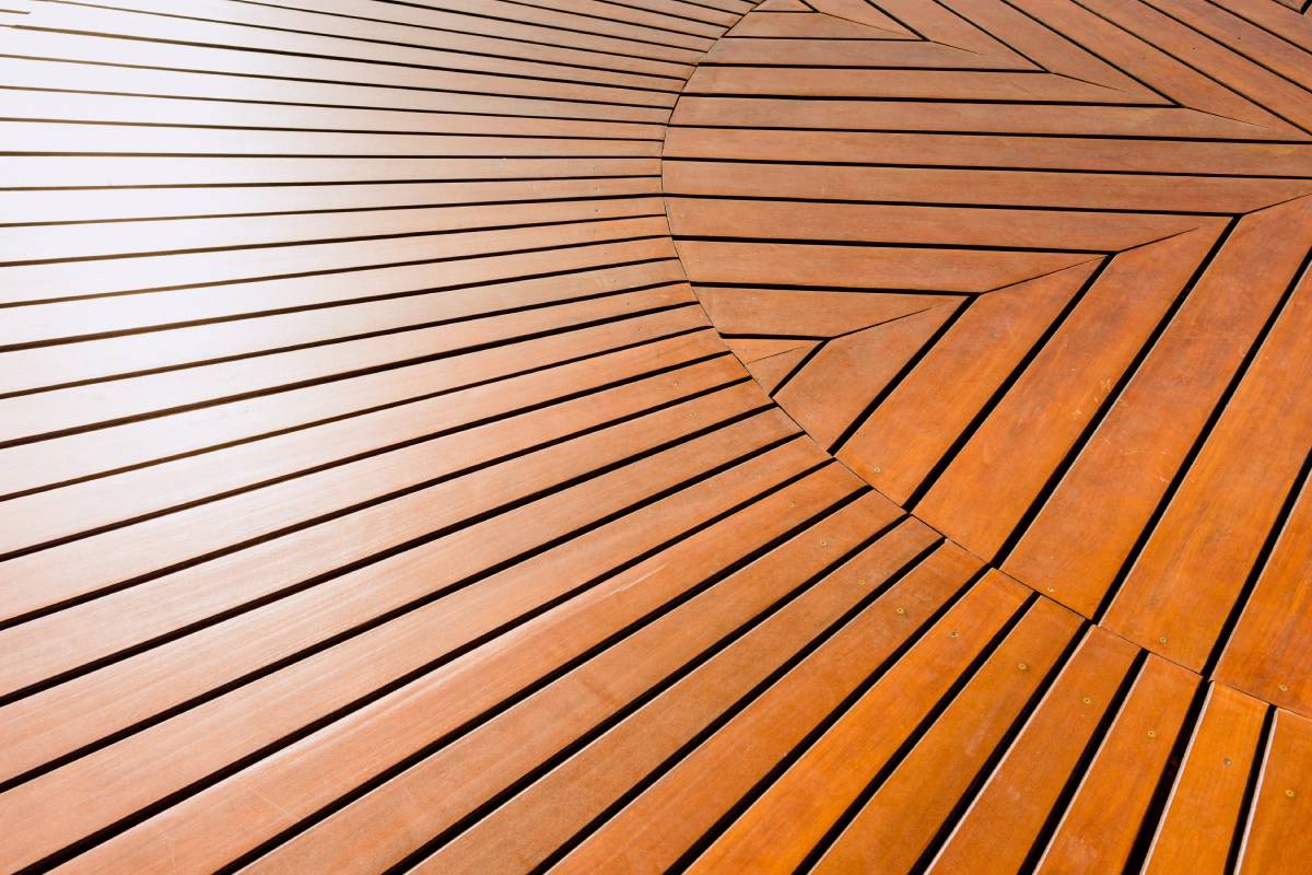 Background of a varnished and polished brown wooden boards.