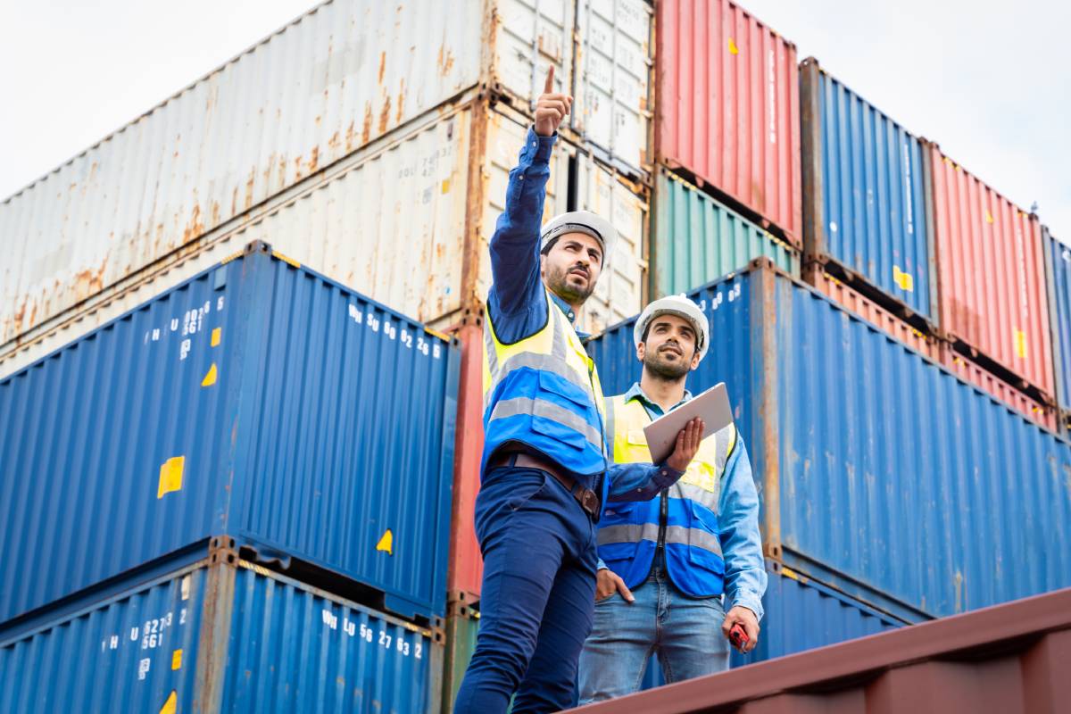 two-male-engineers-in-a-container-shipping-company-2023-11-27-04-52-28-utc (1)